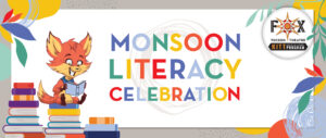 Kitt the Fox reading books, on the title for the Monsoon Literacy Celebration